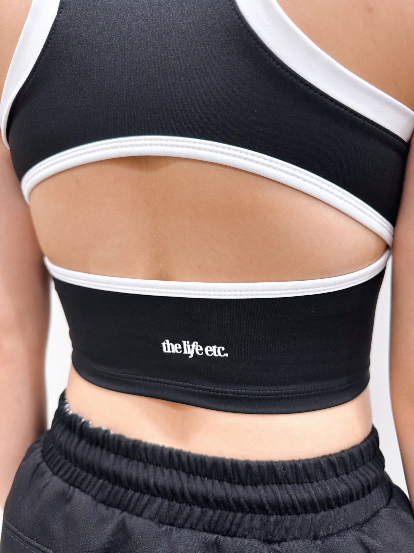 Free Form Padded Zip-up Tank top