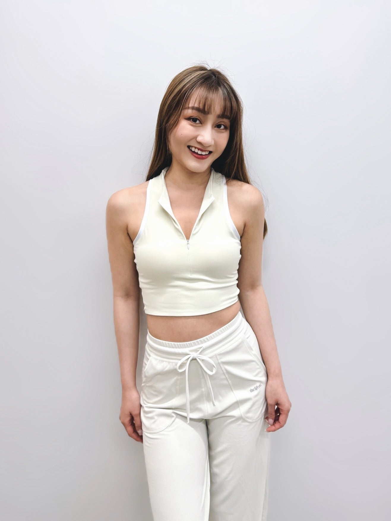 Free Form Padded Zip-up Tank top